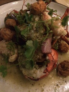 Lobster with green curry, fried mushrooms, and scallions